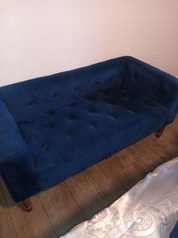 A BEAUTIFUL VELVET COUCH