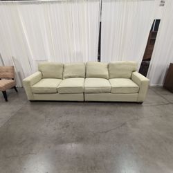 Light Green Upholstered Loveseat with Single Arm