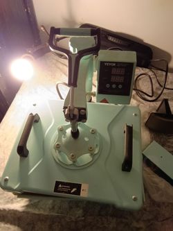 Brand new heat press machine never used with hat press selling $140 start making shirts for business