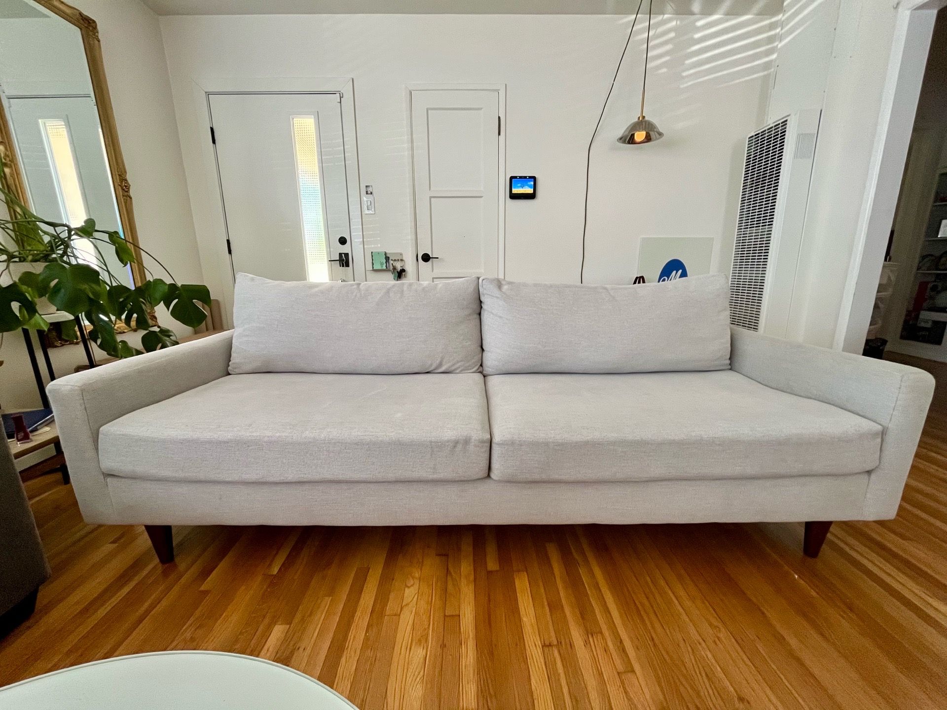 Grey Mid-Century Modern style sofa