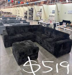 Black sectional sofa and ottoman 99x99