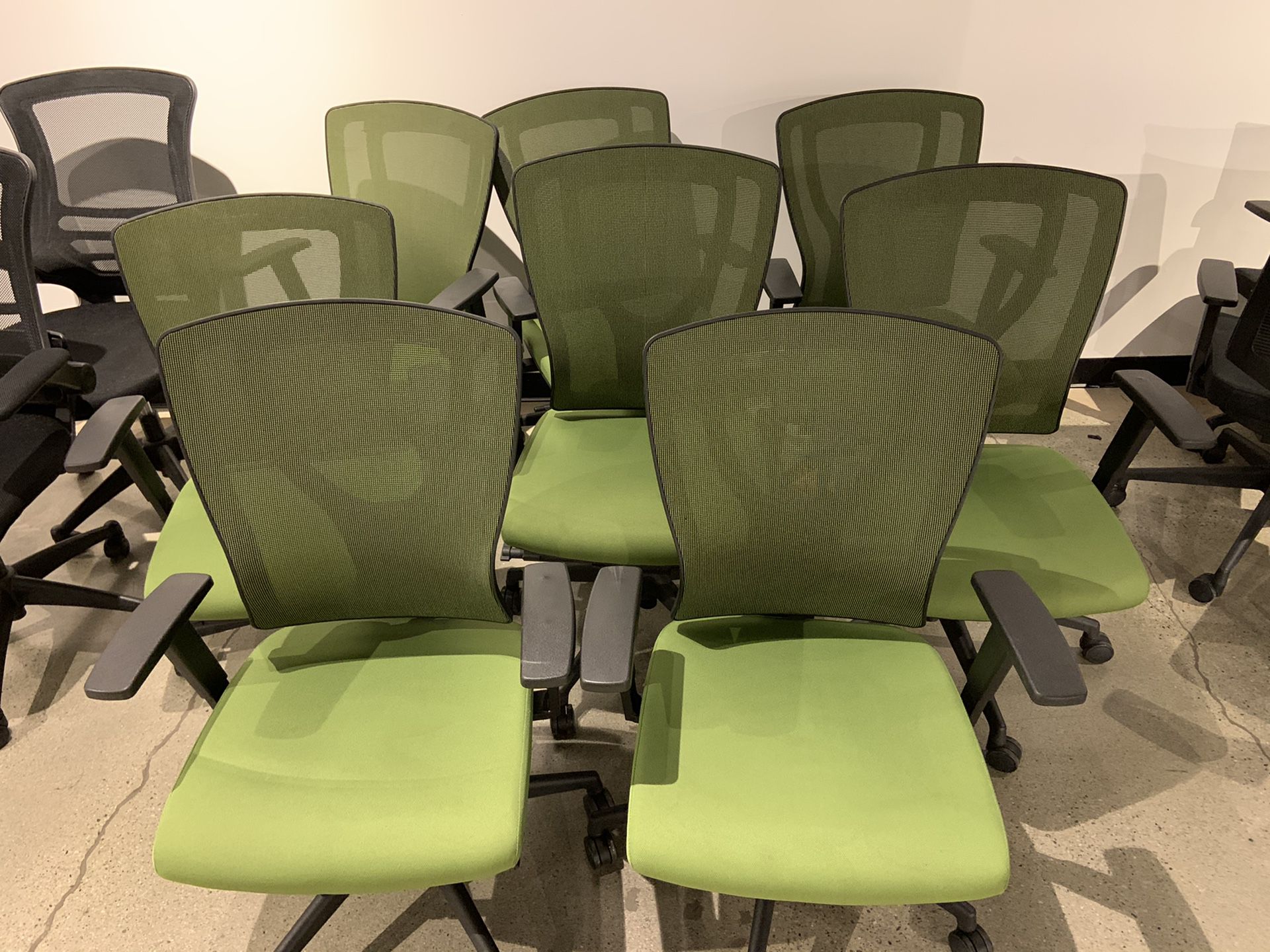 X8 Office Chairs. Adjustable Heights and Armrest. Comfy and rolls on wheels