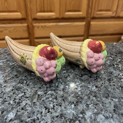 Vintage ceramic Handpainted Fruit pair of salt and pepper shakers.  Size approximately 5 inches long, 2 1/2 inches tall and 2 1/2 inches wide. 