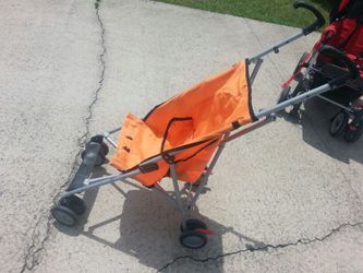 Orange umbrella stroller