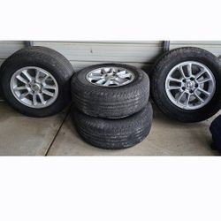 Goodyear Set of 4 tires/rims P245/7017