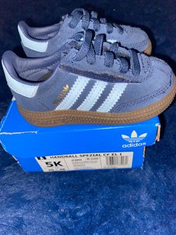 Navy blue toddler Adidas shoes
