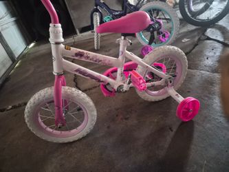 Girls huffy bike with training wheels