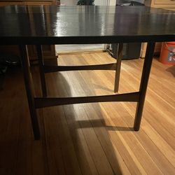 Beautiful, antique drop-down dining table, refinished black on top teak bottom