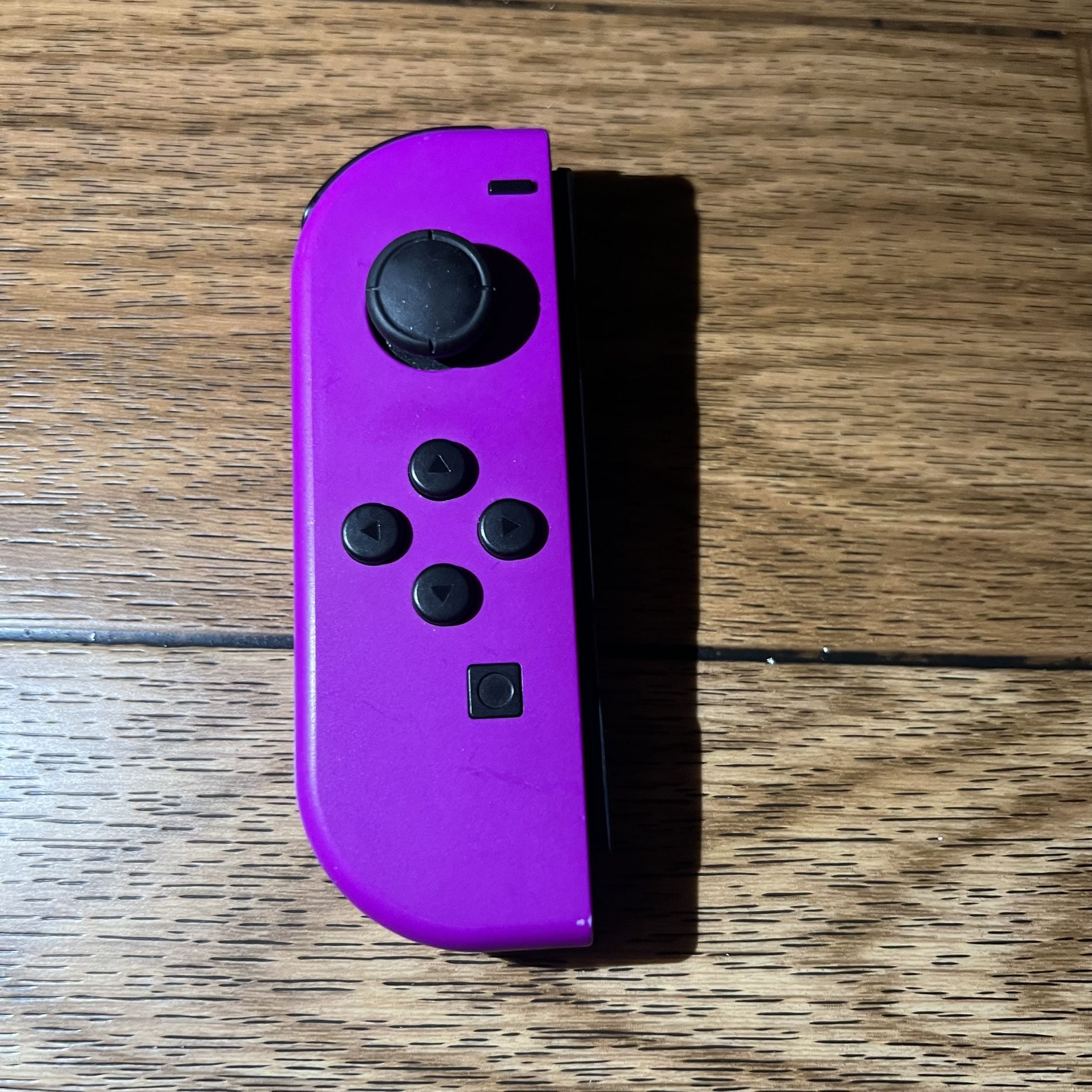 Purple left Nintendo switch Joy cons