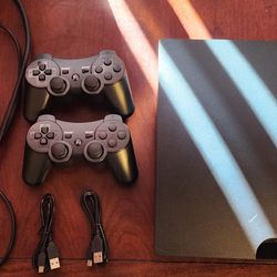 PS3 Slim 149gb With 2 Controllers And 15 Games
