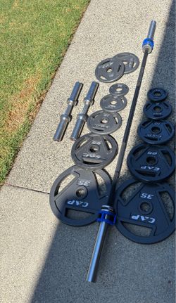 15 kg women’s bar with dumbbell weights handles and Olympic weights 2x35, 2x25, 4x10, 2x5 and 2x2.5 lb lbs collar locks included