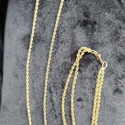 Silver plated Gold 8k Necklace with matching bracelet.