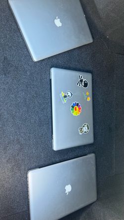 3 Macbook Pros and 1 charger old gen