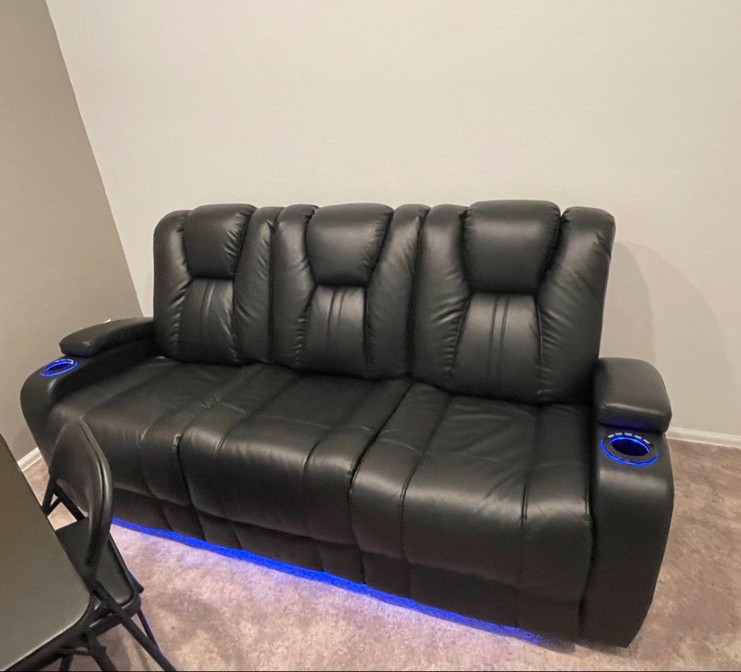 Black Leather Sofa reclines with LED lights