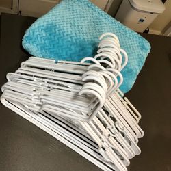 White Clothes Hangers & Throw Blanket