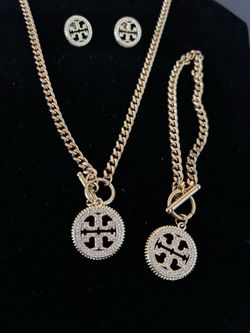 Tory Burch 3 pieces necklace set gold plated