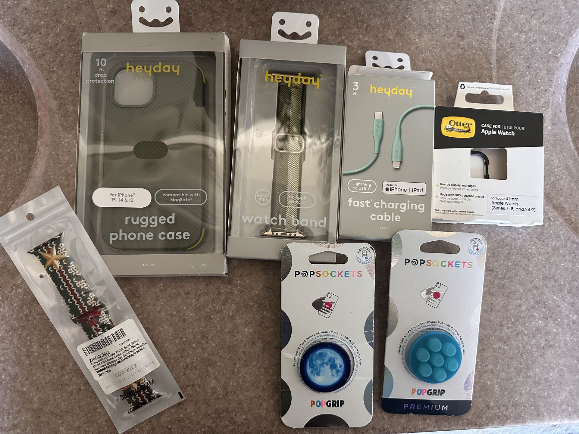 Apple iPhone and watch accessories set.