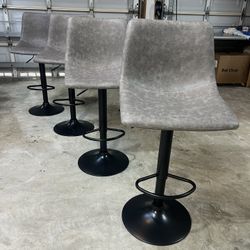 New Adjustable Swivel Bar Stools - Assembled - 75$ Each - Modern Design with Faux Leather - Gray