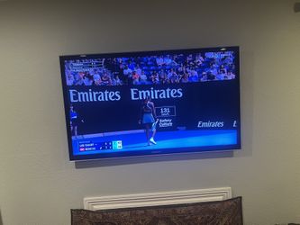 Elegant 55” Samsung Flat Screen TV