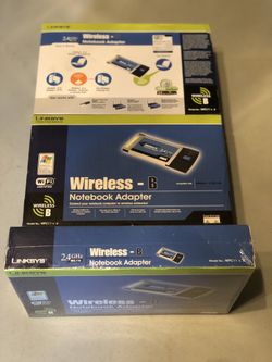Five linksys notebook adapter BRAND NEW SEALED