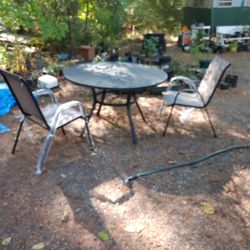 New never used iron Outdoor table& 2 Chairs