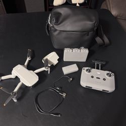 DJI Mini 2 Drone 5 batteries, case, controller, extras