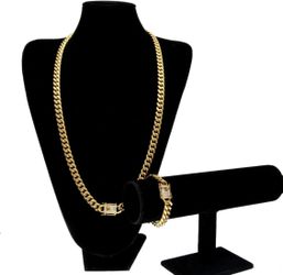 New 18 k yellow gold Cuban link chain and bracelet
