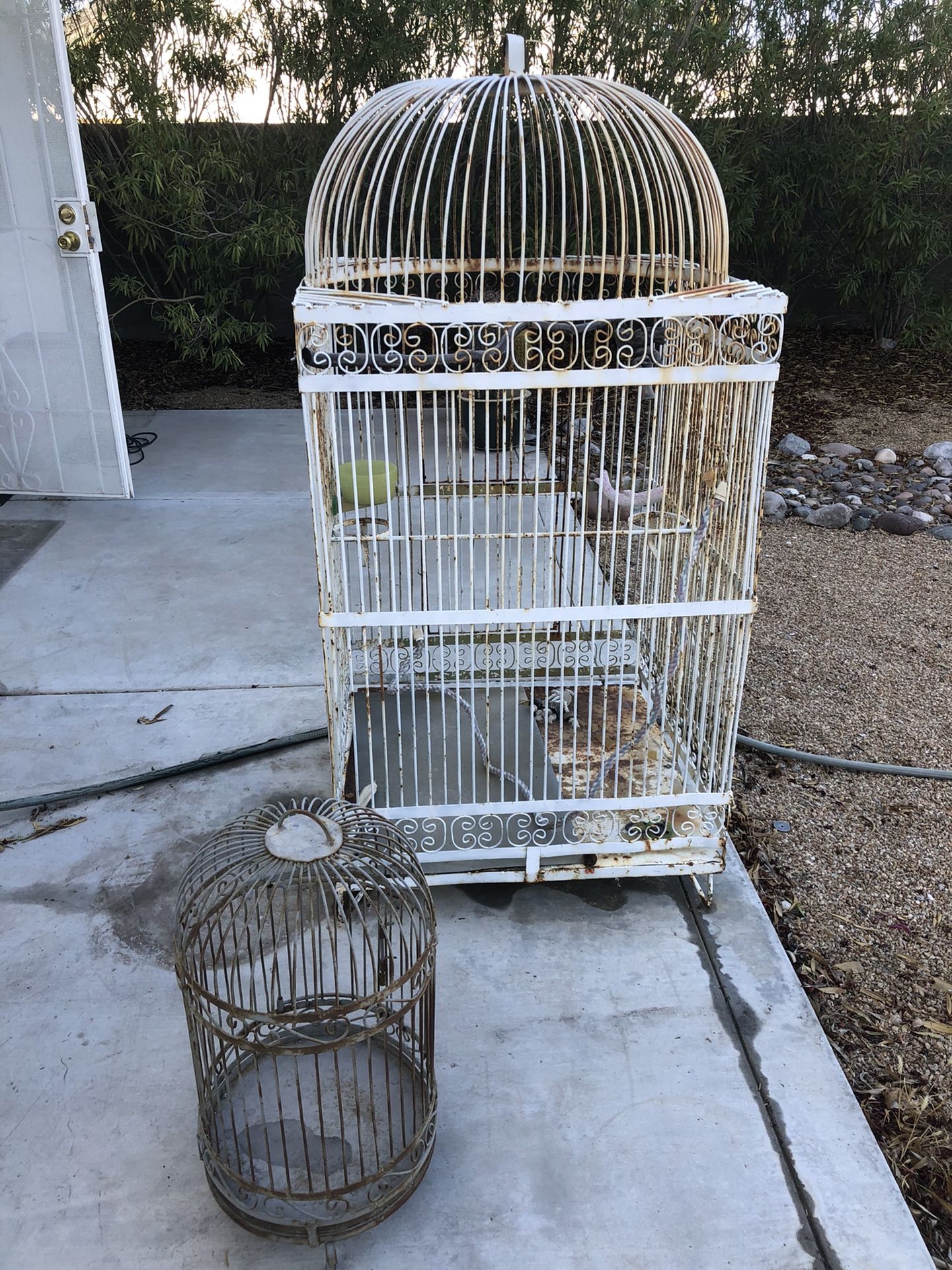 Bird Cages. One large, one small.