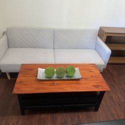 Coffee Table 44” Long 22” Wide And 18” 1/2 High In Good Condition Also Available Futon Behind It For $110 