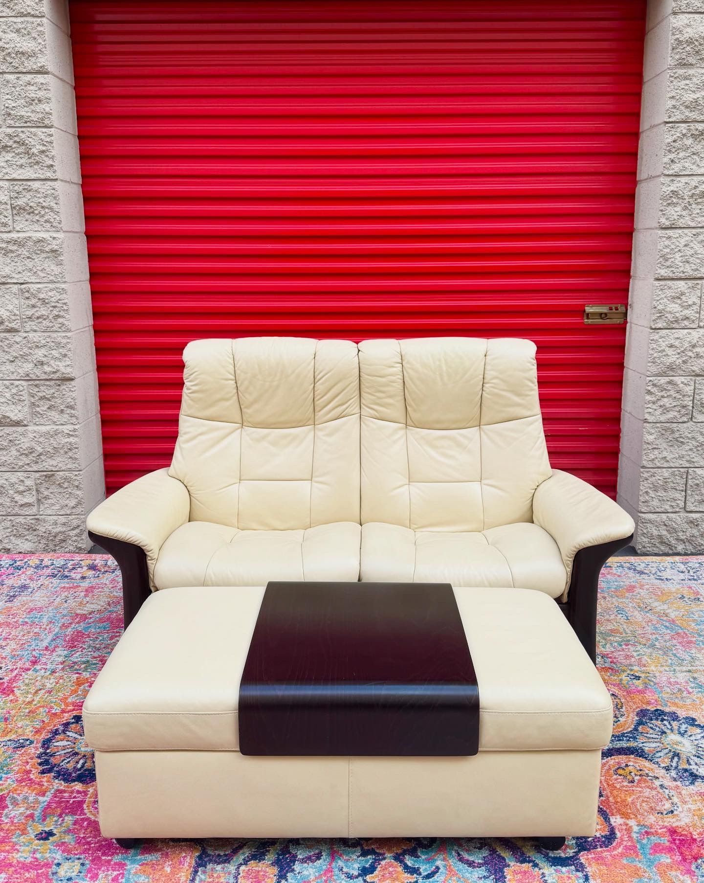 Leather Loveseat And Ottoman By Stressless