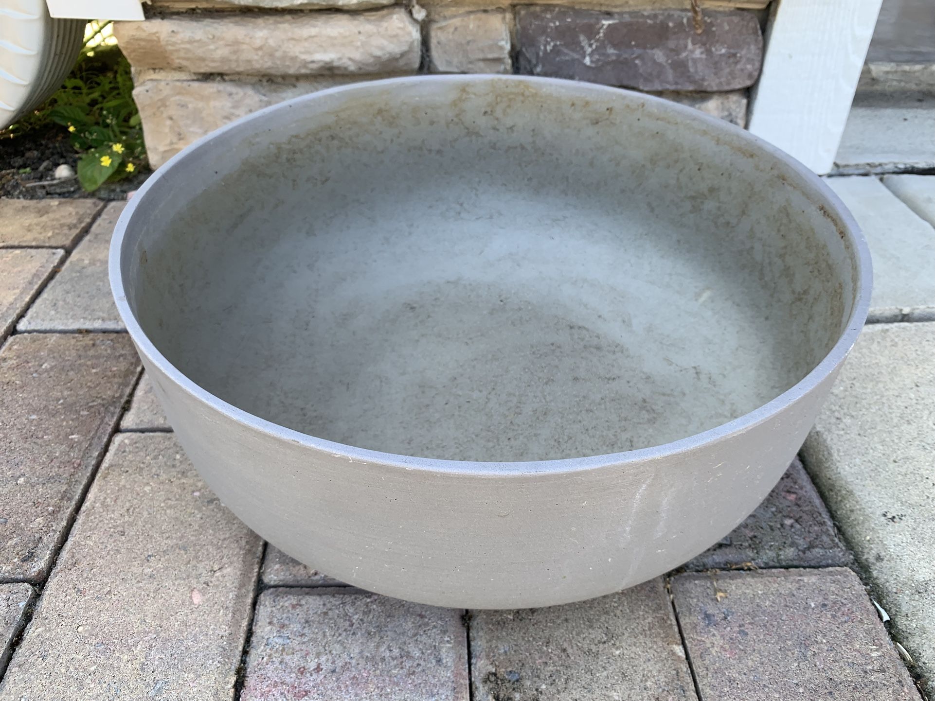 14 Inches Wide Heavy Cast Material Flower Pot, Has Swirl Design A round The Outside, Light Gray Color, No Drainage Hole