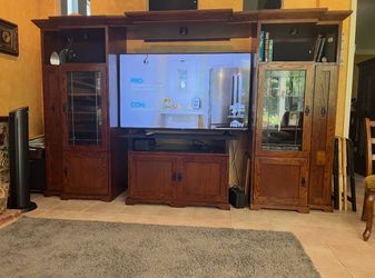 Tv entertainment center everything in the photo except for the tv