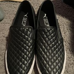 Puma Black Slip Ons 