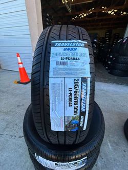 Set of Four (4) 2056016 Travelstar long mileage tires with free Installation 205-65-16