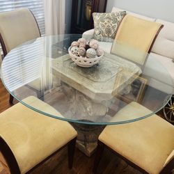 Dining Room Table and 4 Chairs. Glass Top is very heavy. Must be able to pick up from location.