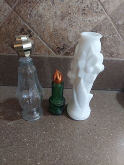 3 vintage avon bottles