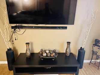 Table and two floor vases