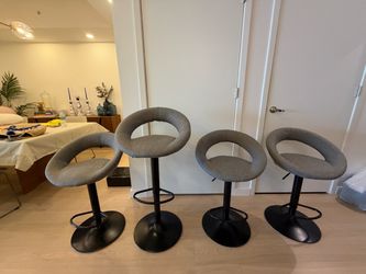 4 gray fabric bar stools with adjustable seat