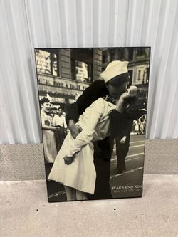War’s End Kiss photo 1945. framed on glossy finish. 36” x 24” $50