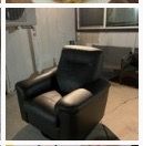 Swivel and reclining single-seater leather sofa.