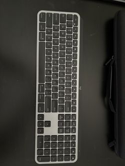 Logitech MX Keys for Mac (will work with Windows)