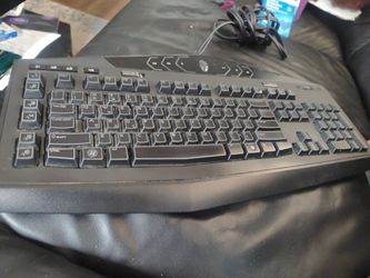 Two lighted gaming keyboards and a folding gaming mouse
