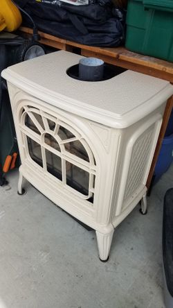 Nepoleon Gas Stove/Heater w/  vent pipes.