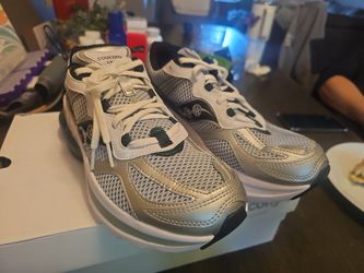 Pair of new SAUCONY GRID NXT shoes
