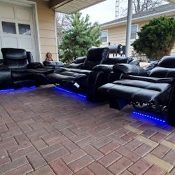 Black leather Style pwr recline couch loveseat chair. Bluetooth sound system. USB charger LED lights.
Good condition. No rips tears odors  
NOTE.....O