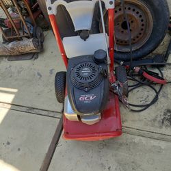 Two Pressure Washers And Garage Opener