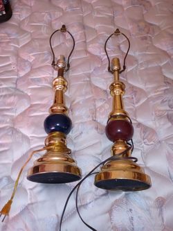 Two lamps one is dark blue one is burgundy