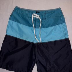 Men’s GAP colorblock striped blue swim trunks in size xs