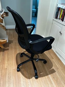 Black ergonomic adjustable desk chair