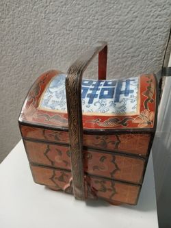 Chinese red Lacquer tierd box with porcelain lid